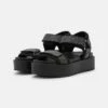 DKNY CERRINA PLATFORM SPORT - Platform Sandals - Black -Bag Haven Store 02d56d8acd814fd18ca687e296e6220b