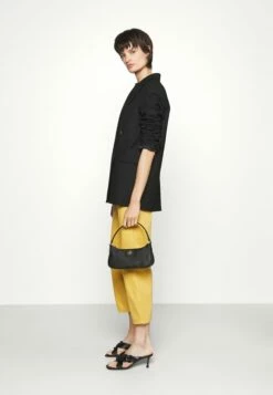 DKNY CAROL BAGUETTE - Handbag - Black/gold