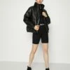 DKNY LOGO APPLIQUE FUNNEL NECK PUFFER - Winter Jacket - Black -Bag Haven Store 0c7b9fb6c9ed4e11b7627b565f499d0f