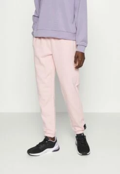 DKNY EMBOSSED LOGO HIGH WAIST JOGGER - Tracksuit Bottoms - Rosewater