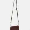 DKNY BRYANT DOME SUTTON - Across Body Bag - Aged Wine -Bag Haven Store 1300d83b6c5b462ca9d7f67379b82e9b