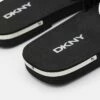 DKNY LOGO SLIDE - Mules - Black/white -Bag Haven Store 1367e25ef4ef49cbbe9c1dc0b0c4e8c0