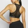 DKNY MEDIUM IMPACT SEAMLESS BRA REMOVABLE CUPS - Medium Support Sports Bra - Black -Bag Haven Store 2366c11c8e8e45ccb186ed2a6fe786ce
