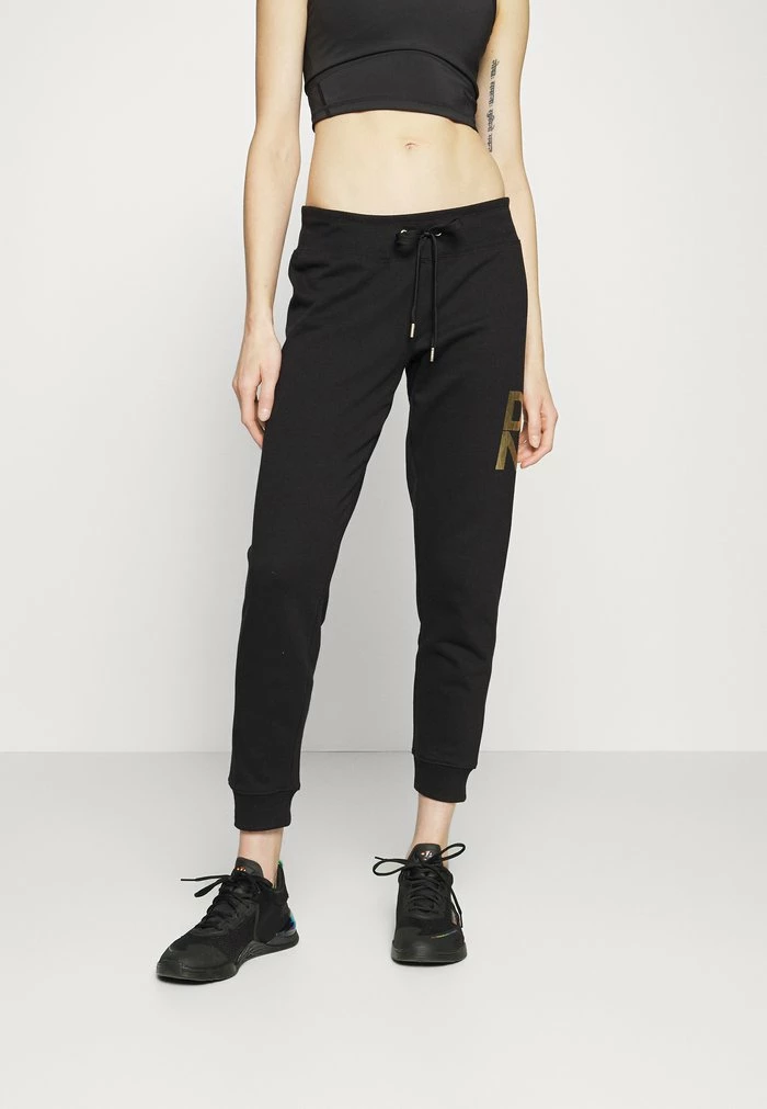 DKNY STACKED LOGO - Tracksuit Bottoms - Black/gold 3 DKNY STACKED LOGO - Tracksuit Bottoms - Black/gold