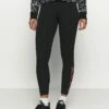 DKNY HIGH WAIST 7/8 LEGGINGWITH PRINTED SIDE LOGOS - Leggings - Black -Bag Haven Store 2b45392a61b8406a85747dc688adb332
