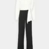 DKNY SLEEVE VNECK COMBO - Jumpsuit - Ivory/black -Bag Haven Store 2bb546008e2049bdb54aa43888239d35