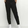 DKNY LOGO JOGGER - Tracksuit Bottoms - Black -Bag Haven Store 307ab623e12442d2adf0dd02c3b8668d