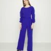 DKNY RUFFLE CASCADE SLEEVE - Jumpsuit - Purple Quartz 1 DKNY RUFFLE CASCADE SLEEVE - Jumpsuit - Purple Quartz -Bag Haven Store 336c06cba4b64dbd8a6168ad300151c6
