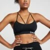 DKNY LOW IMPACT STRAPPYSEAMLESS BRA REMOVABLE CUPS - Light Support Sports Bra - Black -Bag Haven Store 336fe1af885849b2b2811080ccd4ed94