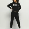 DKNY LOGO JOGGER - Tracksuit Bottoms - Black 10 DKNY LOGO JOGGER - Tracksuit Bottoms - Black -Bag Haven Store 3978e5298cb342cfbd13d58211d51baa