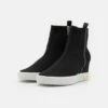 DKNY CALI WEDGE - High-top Trainers - Black/gold -Bag Haven Store 426cde69be104918be05411a34be6e28