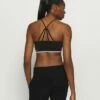 DKNY LOW IMPACT STRAPPY BRA REMOVABLE CUPS - Light Support Sports Bra - Black -Bag Haven Store 4e6a88dabde64befa87fa12ae6255fcf