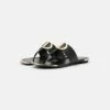 DKNY HALCOTT - T-bar Sandals - Black -Bag Haven Store 608a4b7930234956aab3a9d2b4a01e4a