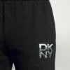 DKNY STACKED CITY LOGO HIGH RISE - Tracksuit Bottoms - Black -Bag Haven Store 62954cc9965f4db197824d2e07782bb1