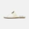 DKNY HALCOTT FLAT THONG - T-bar Sandals - Vanilla -Bag Haven Store 702f91d56b644af082ccea3c840873ad