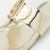 DKNY HALCOTT FLAT THONG - T-bar Sandals - Platinum -Bag Haven Store 748be6cefb774d13bc1a458f7c9f9a54