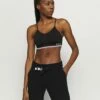 DKNY LOW IMPACT STRAPPY BRA REMOVABLE CUPS - Light Support Sports Bra - Black -Bag Haven Store 74d8ce2c6fe7450d9539493fd07ca3a0