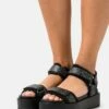 DKNY CERRINA PLATFORM SPORT - Platform Sandals - Black 1 DKNY CERRINA PLATFORM SPORT - Platform Sandals - Black -Bag Haven Store 7b8dc85070e14a00a1fcb99239496e24