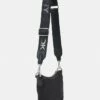 DKNY CAROL SADDLE - Across Body Bag - Black/silver-coloured -Bag Haven Store 9acfcd8de4554f7bb609c73357cd4062