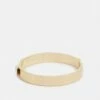 DKNY LOGO RIVET BANGLE - Bracelet - Gold-coloured -Bag Haven Store a4ef05472c5d4ff5b0ec1d582b9ef8eb