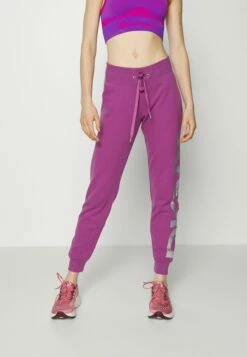 DKNY EXPLODED LOGO - Tracksuit Bottoms - Wild Aster/silver