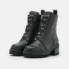 DKNY BARRETT BOOT - Platform Ankle Boots - Black/white -Bag Haven Store c294e45d9d684d5c882ca92cedea0b7d
