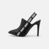 DKNY GLIN SLINGBACK MULE - Classic Heels - Black/white 10 DKNY GLIN SLINGBACK MULE - Classic Heels - Black/white -Bag Haven Store c9834b229c784f8ea2a7cc58da37b131