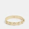 DKNY LOGO RIVET BANGLE - Bracelet - Gold-coloured -Bag Haven Store ca7d8fdcfe1d4e3c9b9ff7d9492c148b