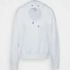 DKNY CUT OUT CROPPED HOODIE - Sweatshirt - White -Bag Haven Store d075f2a48cfa409bb25472c825549375