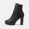 DKNY TESSI PLATFORM BOOTIE - Platform Ankle Boots - Black/shiny Black 10 DKNY TESSI PLATFORM BOOTIE - Platform Ankle Boots - Black/shiny Black -Bag Haven Store d52e8e3ebf184bb78889772fb9e5ca27