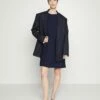 DKNY TRAPEZE WITH LOGO HARDWARE - Jersey Dress - Navy 10 DKNY TRAPEZE WITH LOGO HARDWARE - Jersey Dress - Navy -Bag Haven Store dd7202f8e1494c71ae488f527b2a498c