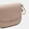DKNY BRYANT SADDLE BAG - Across Body Bag - Cashmere -Bag Haven Store e31f722ea6714e4587d0fce5849edb59