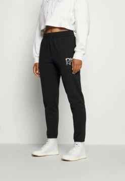 DKNY STACKED CITY LOGO HIGH RISE - Tracksuit Bottoms - Black