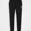DKNY STACKED CITY LOGO HIGH RISE - Tracksuit Bottoms - Black -Bag Haven Store edf845a168ac4e2fb0f475fb9a5d72da