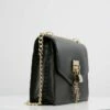 DKNY ELISSA - Across Body Bag - Black/gold -Bag Haven Store f2ef2dcbd1274d1e852d95982dc6558a