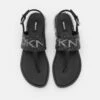 DKNY AMBER SLINGBACK FLAT THONG - T-bar Sandals - Black/gunmetal -Bag Haven Store fa62c5e1e4e744d4ad319a3b25e83b50